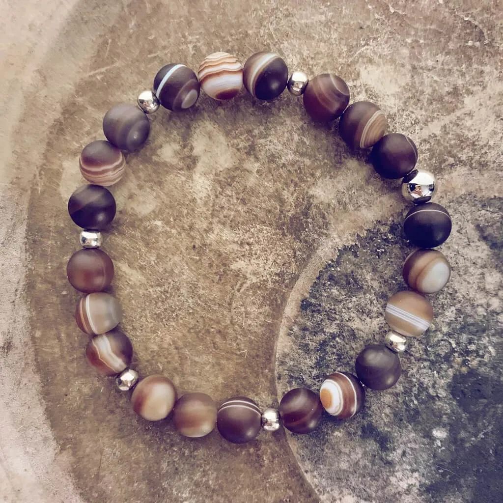 stability II // brown line agate and natural brass mala bead bracelet